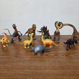 Action Figures Dinosaurs Lotof 10 - Some with Moveable legs and some with Sound
